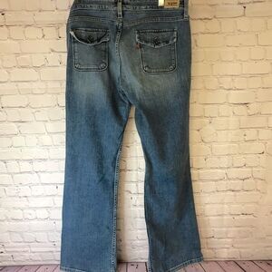Women Levi's 545 Medium Wash Low Bootcut Blue Denim Stretch Y2K Jeans Size 10M